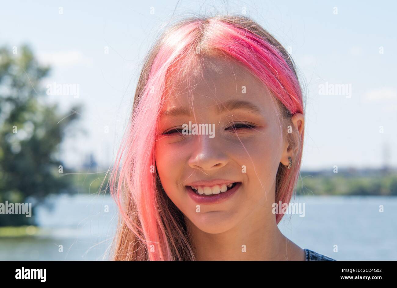 cute child girl portrait . Outdoor portrait of cute little girl in summer  day. Portrait of a little girl with pink hair. Child 9-10 years old.  Teenage Stock Photo - Alamy