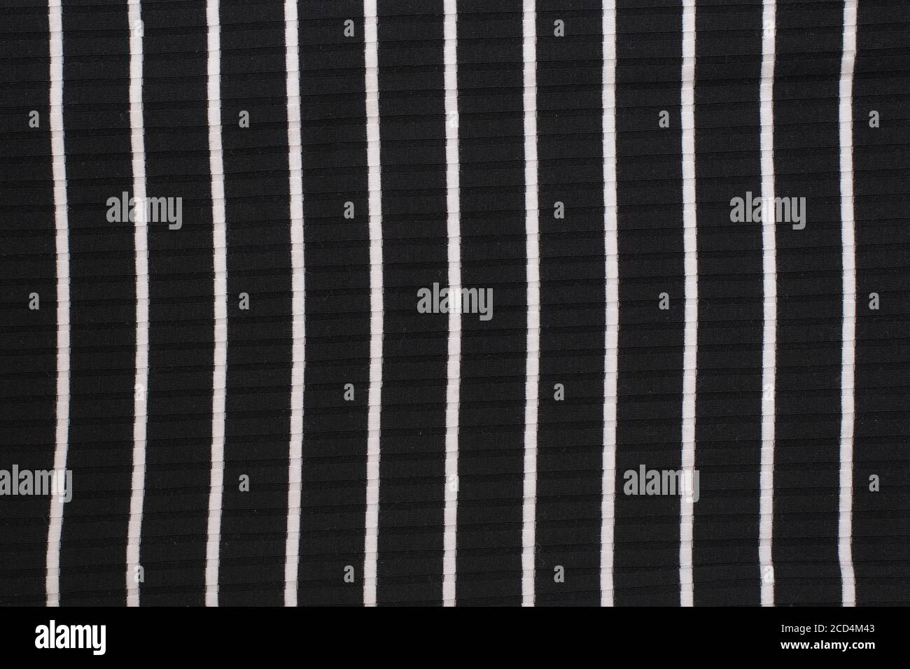Black and white striped knitted fabric. Close up. Fashionable concept Stock Photo