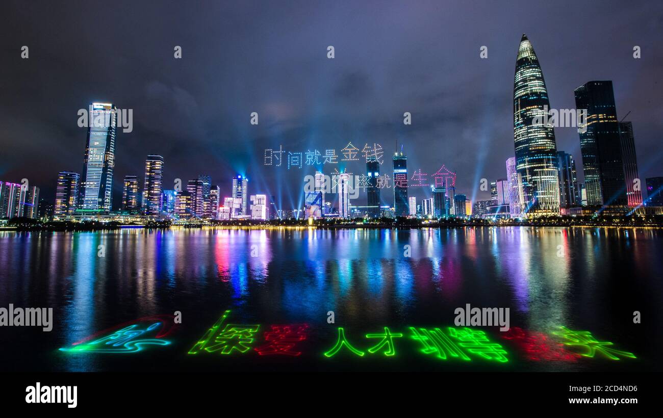 (200826) -- SHENZHEN, Aug. 26, 2020 (Xinhua) -- Photo taken on Aug. 26, 2020 shows a light show in Shenzhen, south China's Guangdong Province. A light show performed with 826 drones combined with city lights started at 08:26 p.m. local time on Aug. 26 in Shenzhen to celebrate the 40th anniversary of the establishment of the Shenzhen Special Economic Zone (SEZ). (Xinhua/Mao Siqian) Stock Photo