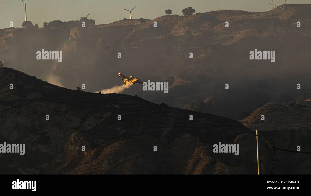 Forest fire fighting operations. Canadair at work. Calabria, Italy