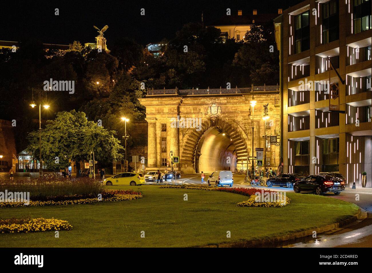 The entrance to the tunnel beneath the Buda Castle District at night Stock Photo