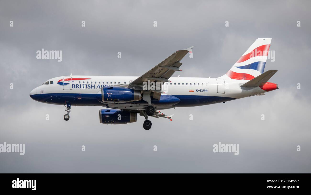Heathrow Airport, London, UK. 26 August 2020. British Airways Airbus A319 G-EUPR on approach to runway 27L at Heathrow. COVID-19 pandemic has seen the airline industry slump worldwide, with approx 11% of passengers at Heathrow in July 2020 compared with the same month in 2019, and approx 25% of air traffic movements at Heathrow in July 2020 compared with July 2019. Credit: Malcolm Park/Alamy. Stock Photo