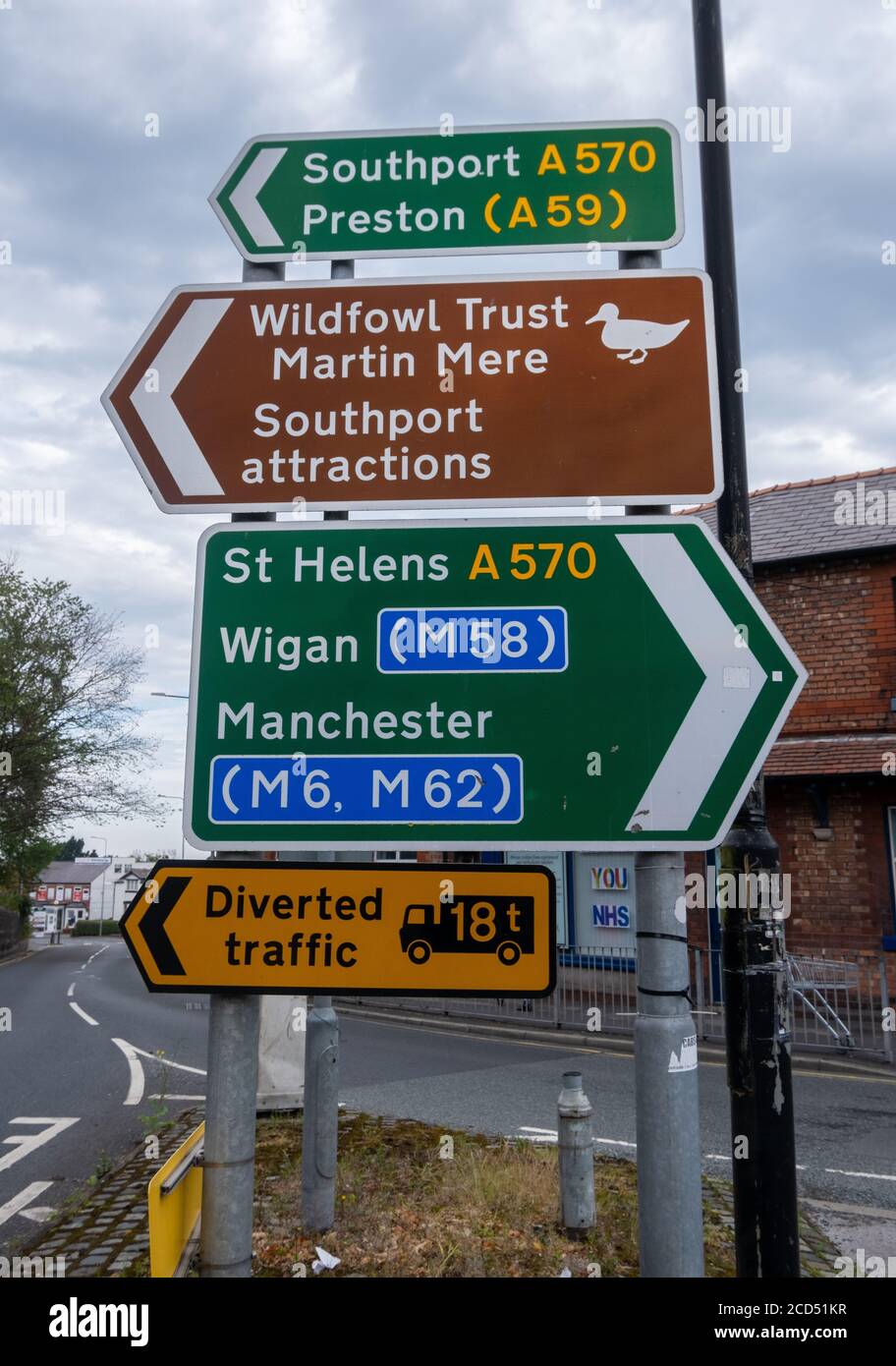 Multiple traffic and tourist attraction signs in Ormskirk Lancashire ...