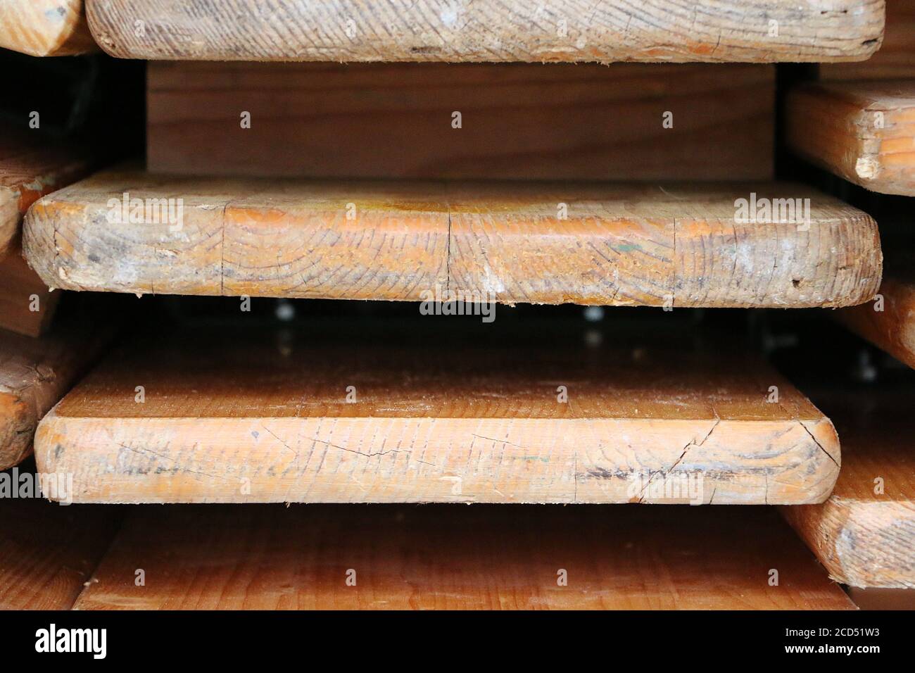 Closeup shot of a stack of folded wooden party tables and benches Stock ...