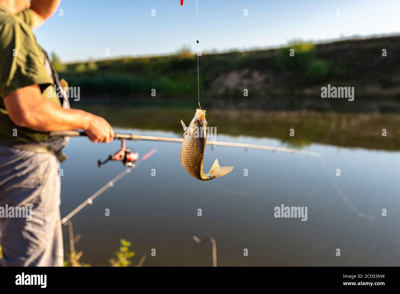 Man holding fish hi-res stock photography and images - Page 11 - Alamy