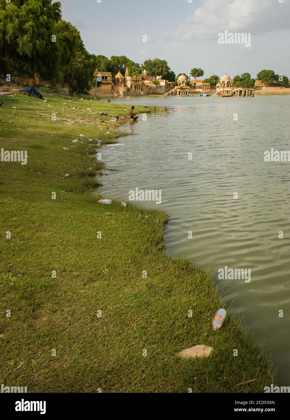 polluted lake plastic bottles and garbage at the lake. plastic pollution. environment pollution Stock Photo