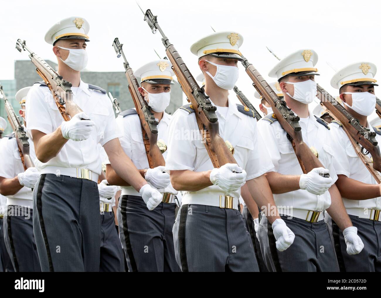 U.S. Military Academy cadets wearing PPE mask join the Class of 2024, Corps of Cadets during the Acceptance Day parade on the Plain August 15, 2020 in West Point, New York. Stock Photo