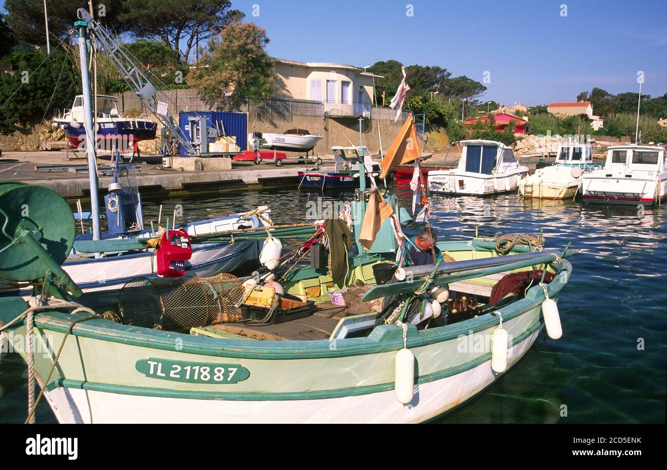 Mediterranean fishing boats in the small port La Madrague peninsula of Giens  Stock Photo - Alamy