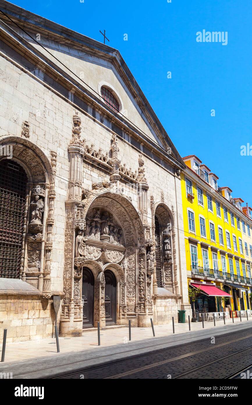 Lisbon street view with the main entrance of the Church of Nossa Senhora da Conceicao Velha Stock Photo