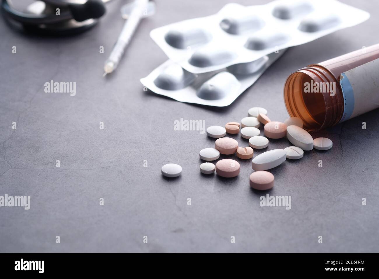 white pills and blister pack on black background  Stock Photo