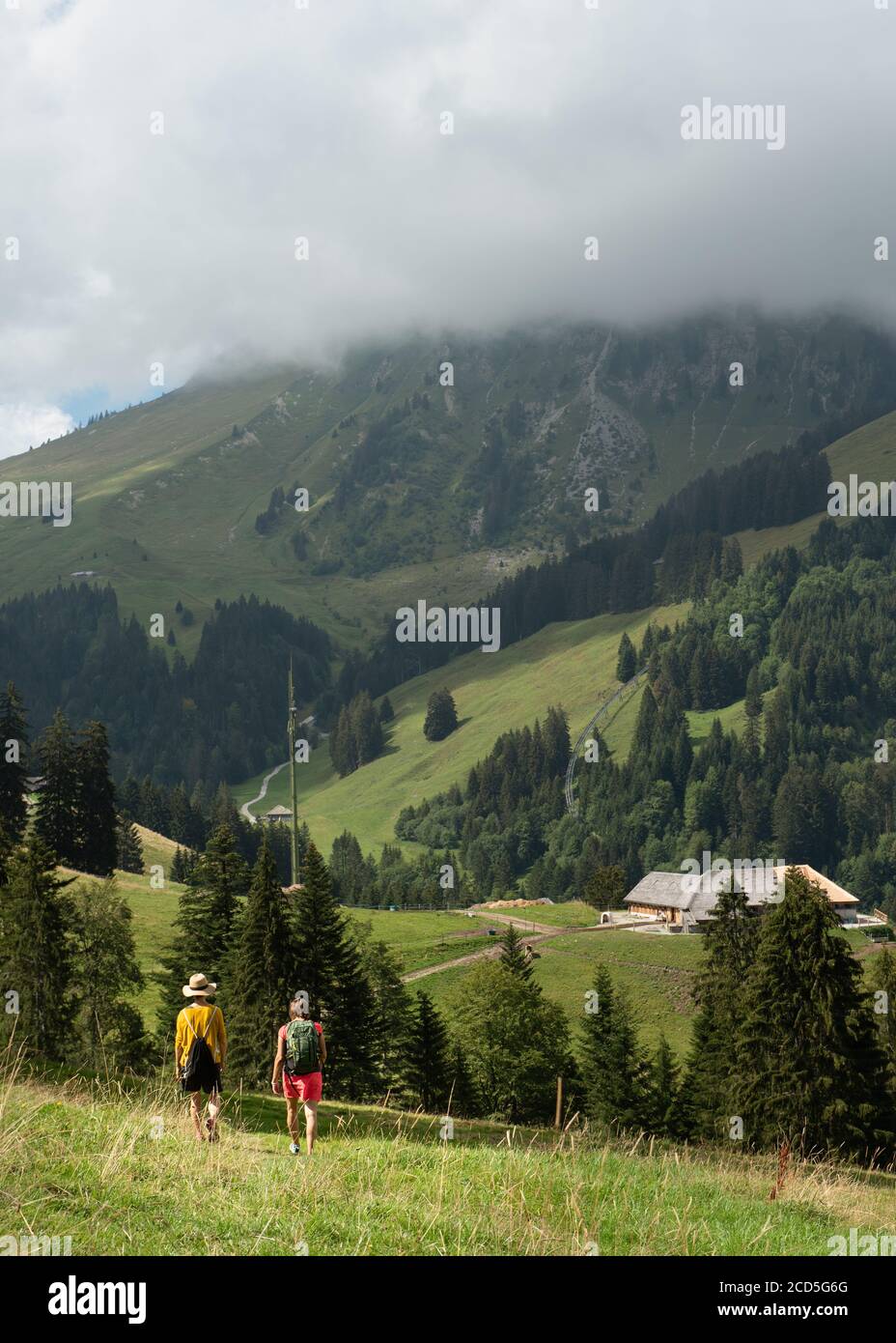 Women hiking in the mountains, Switzerland Stock Photo
