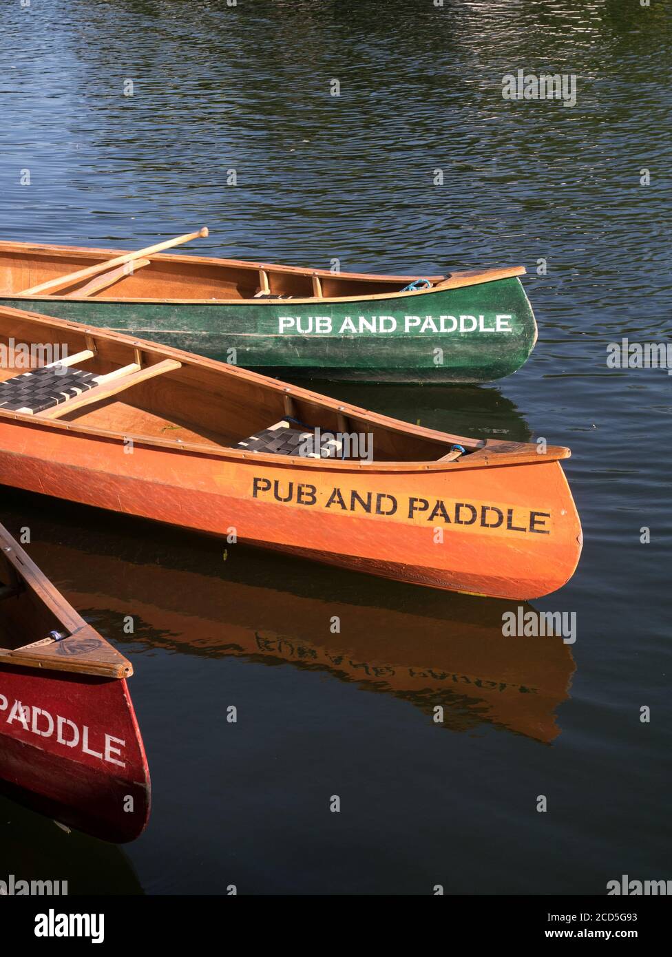 Colourful Canoe Boats available for hire, on the Norfolk Broads