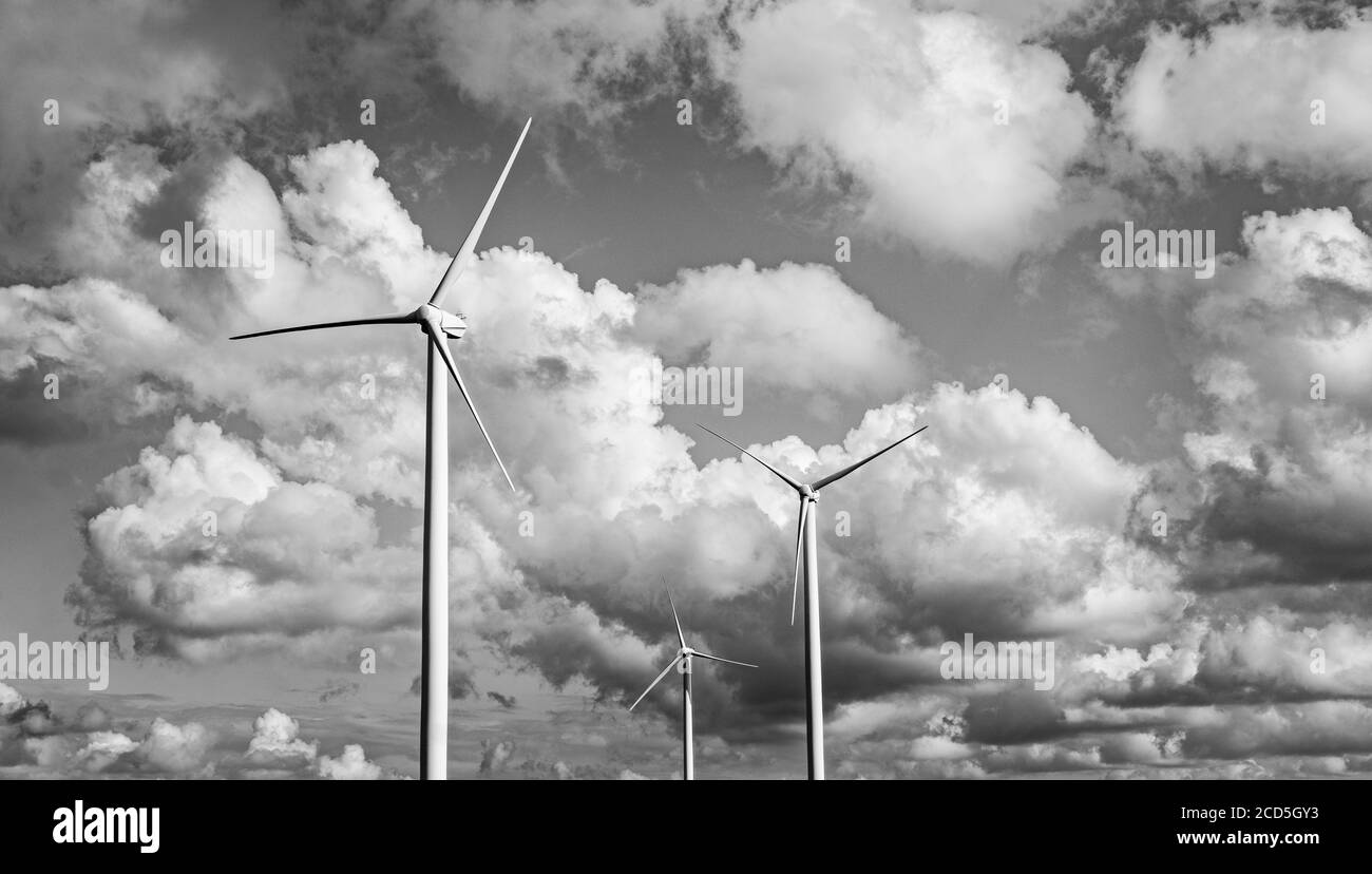 View of wind turbines and clouds Stock Photo