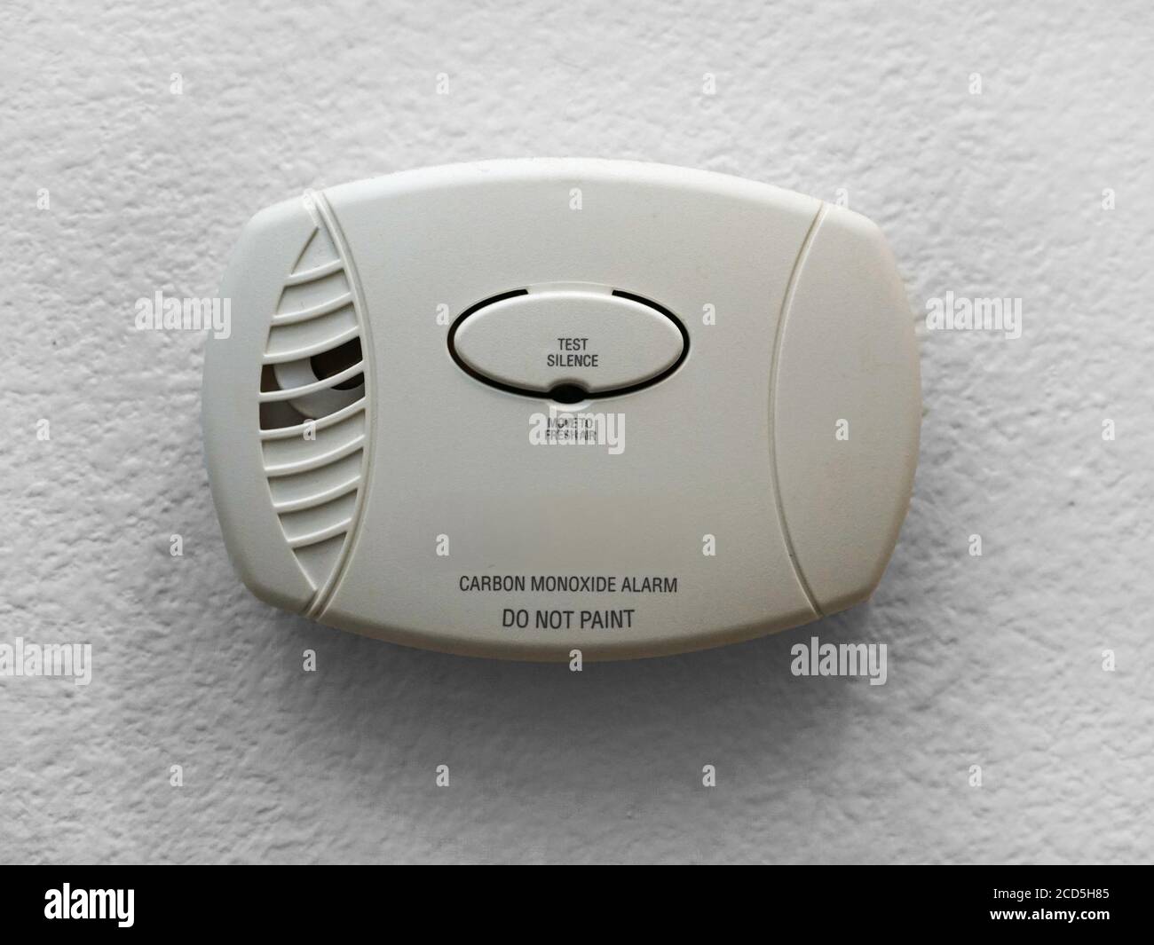 Wall mounted carbon Monoxide alarm installed in a home. Stock Photo
