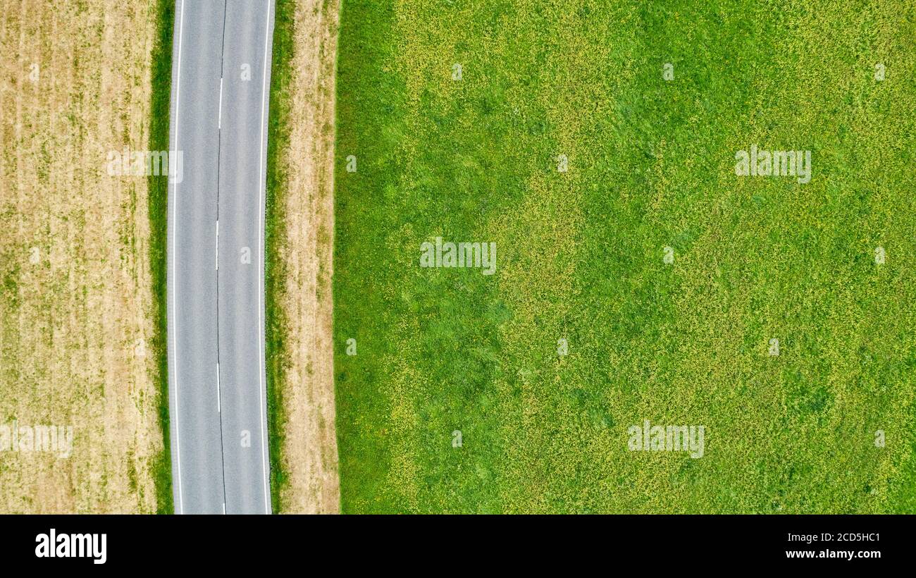 Directly above view of road through rural landscape Stock Photo