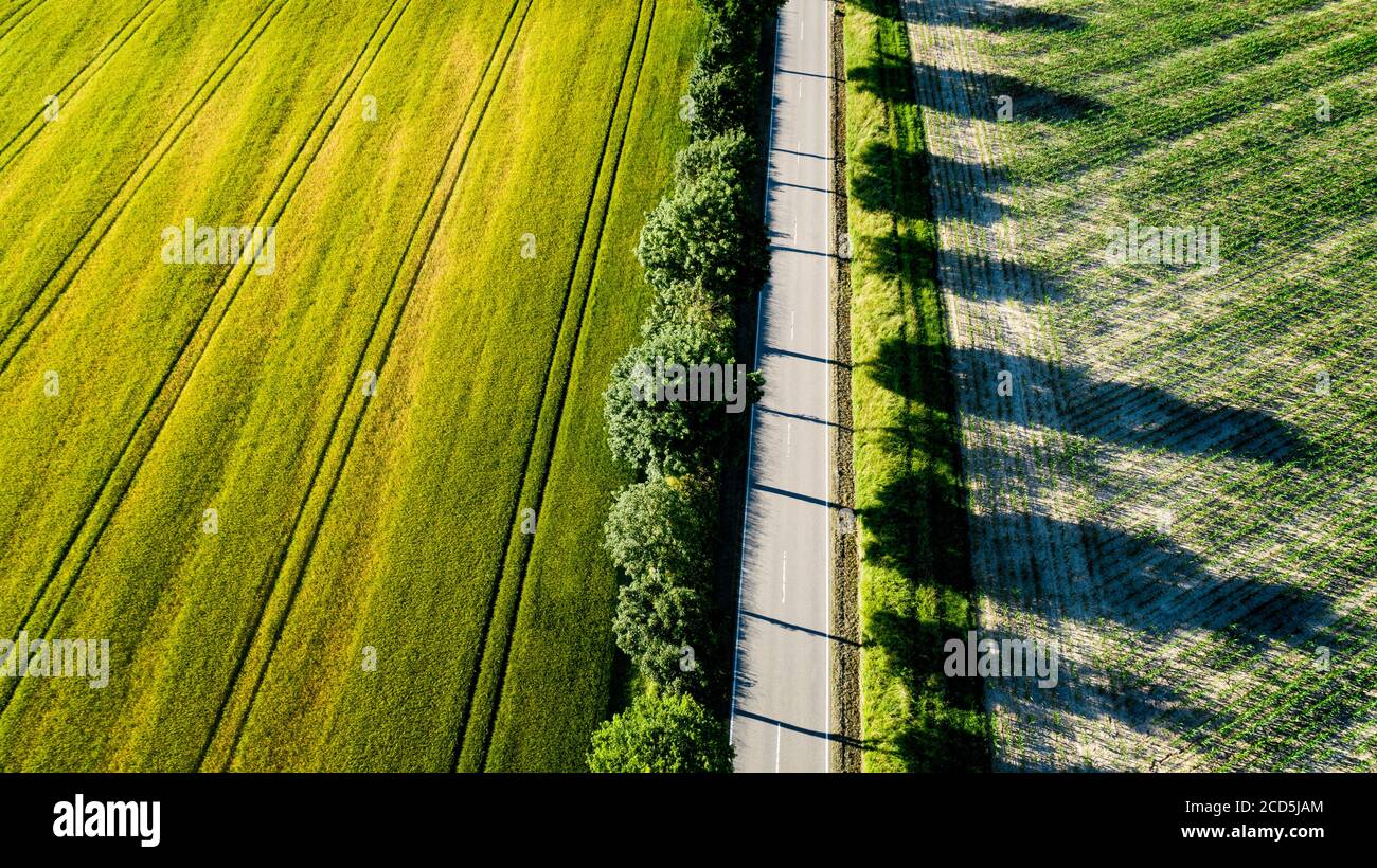 Aerial view of road through rural landscape Stock Photo
