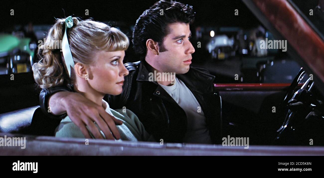 USA. Olivia Newton-John and John Travolta in a scene from the ©Paramount  Pictures movie: Grease (1978). Plot: Good girl Sandy Olsson and greaser Danny  Zuko fell in love over the summer. When