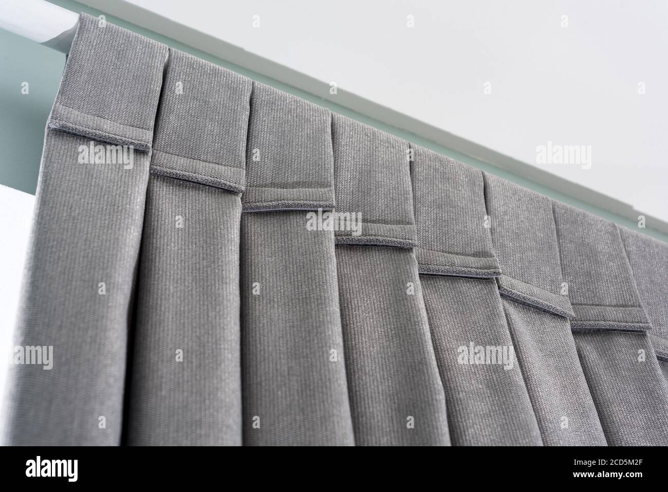 Closeup view velcro loops of curtain in thin and thick vertical folds made  of dense fabric.Textured materials and textiles abstract backgrounds Stock  Photo - Alamy