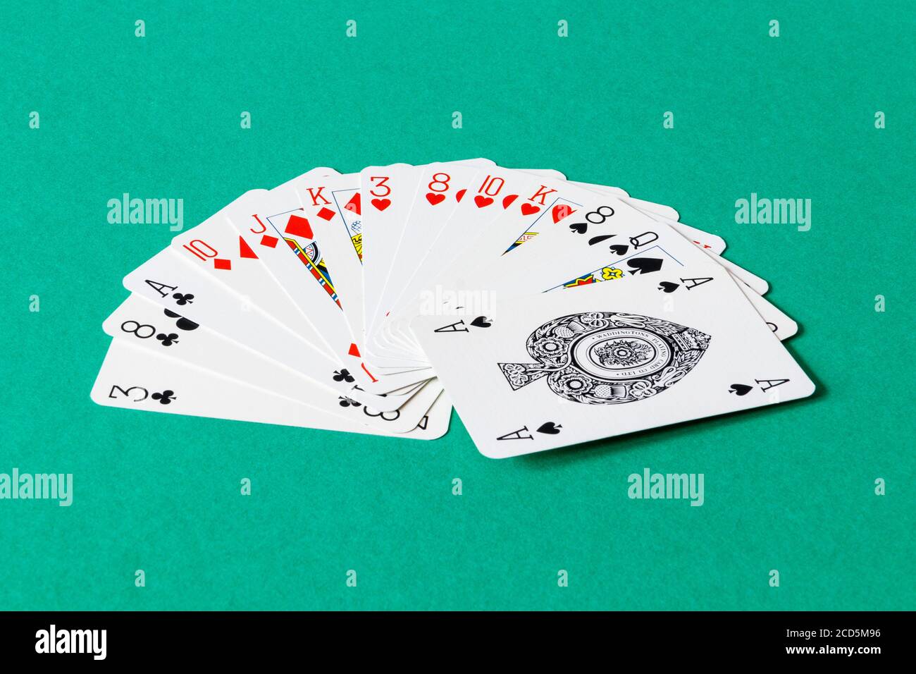 An evenly spread (4333 distribution) biddable hand of 13 cards, sorted into suits and rank, in a game of contract bridge, showing 17 high-card points Stock Photo