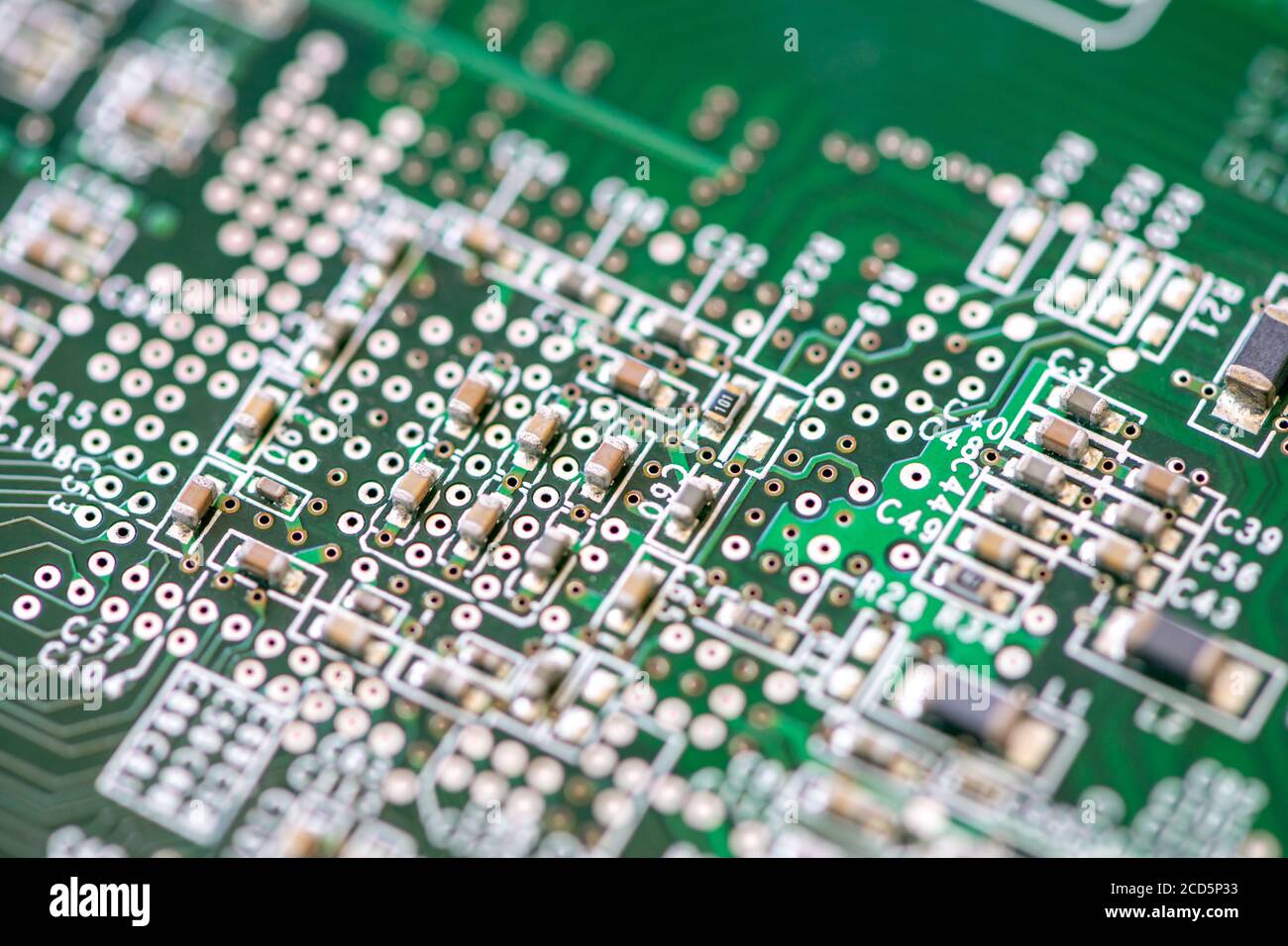 Close-up of a SMD capacitors on a printed circuit board. Electronic ...