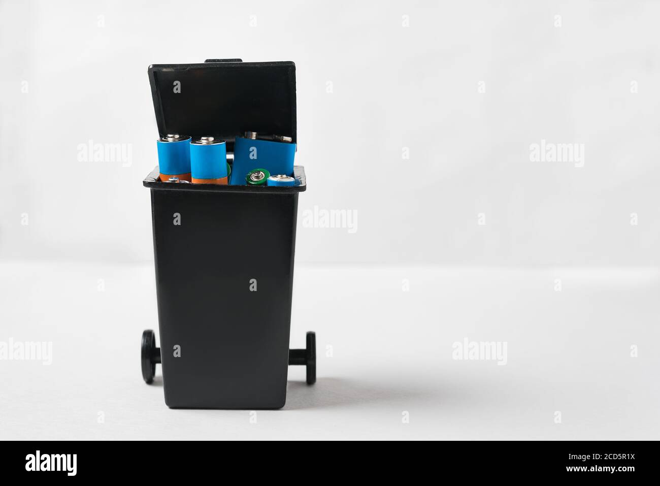 Used batteries in the bin. Collection and recycling concept used