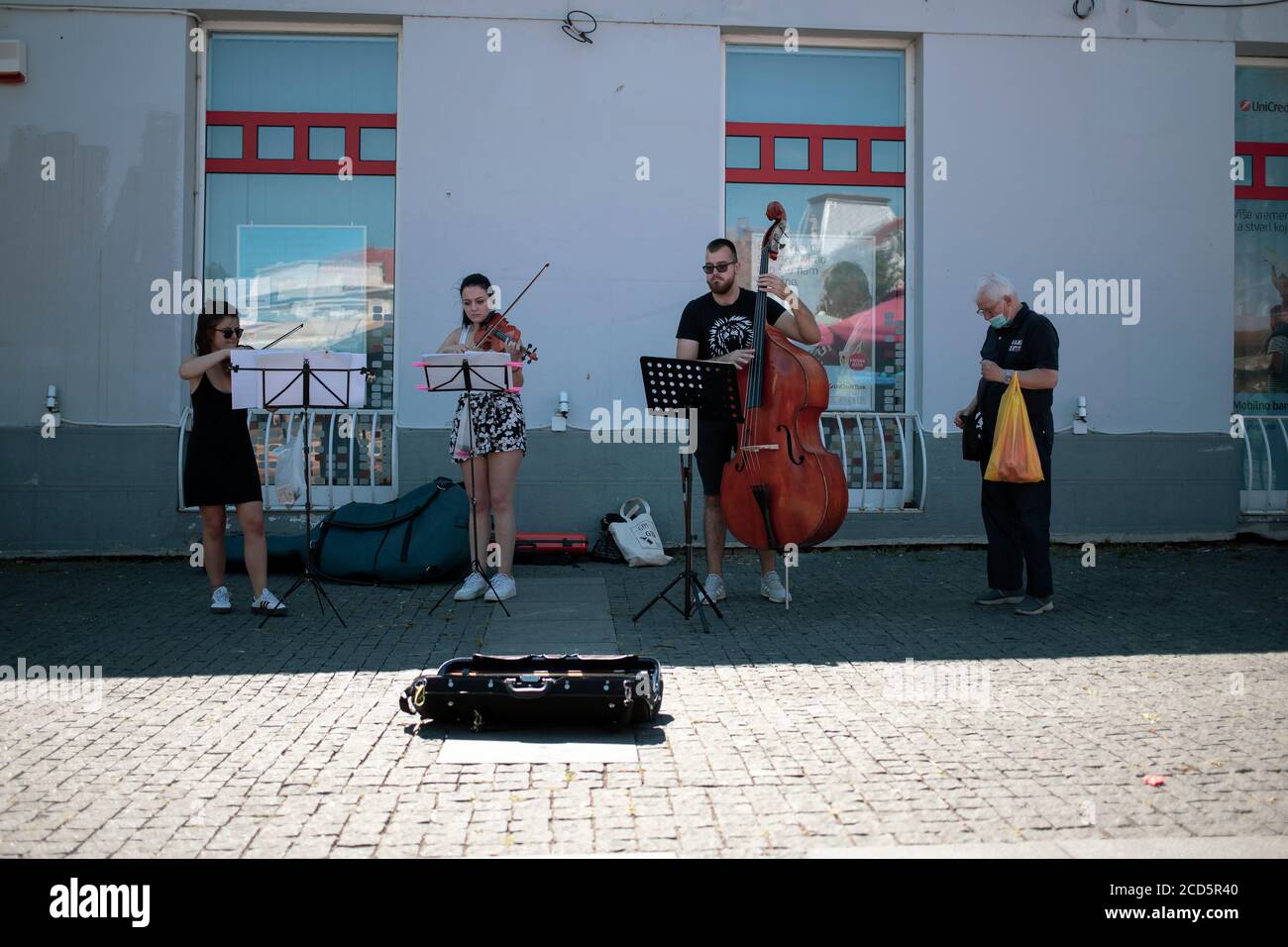 Belgrade, Serbia, Aug 2, 2019: Street musicians performing near Zemun Green Market Stock Photo