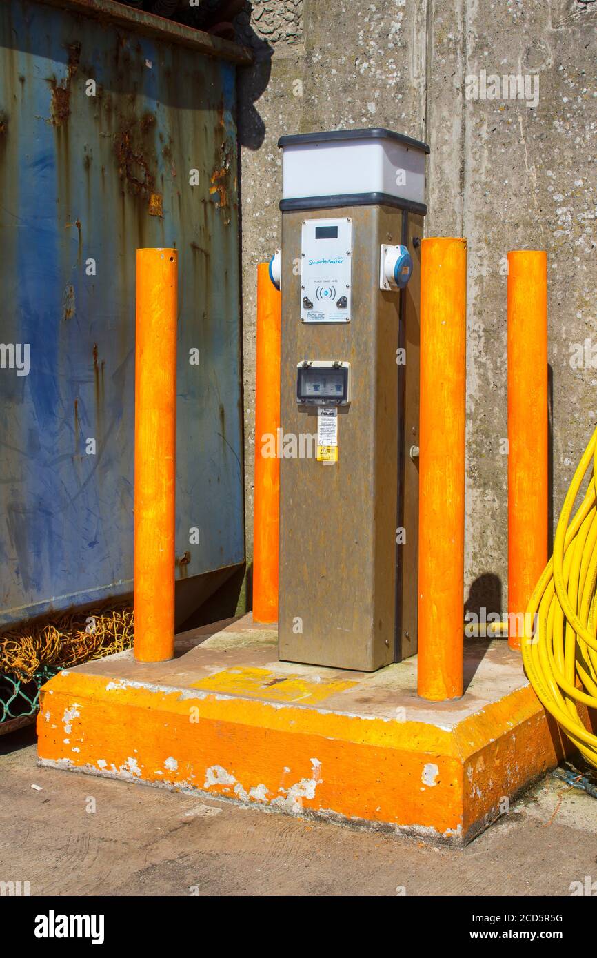 8 August 2019 A secure metered power source on the quayside at Ardglass Harbour in County down northern Ireland. This power supply is available for us Stock Photo