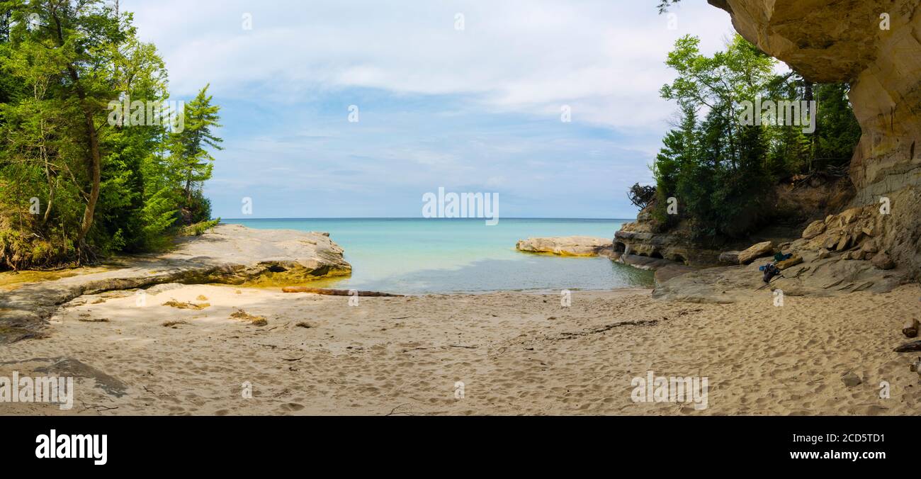 Sandy beach by tiny cove, Pictured Rocks National Lakeshore, Michigan, USA Stock Photo