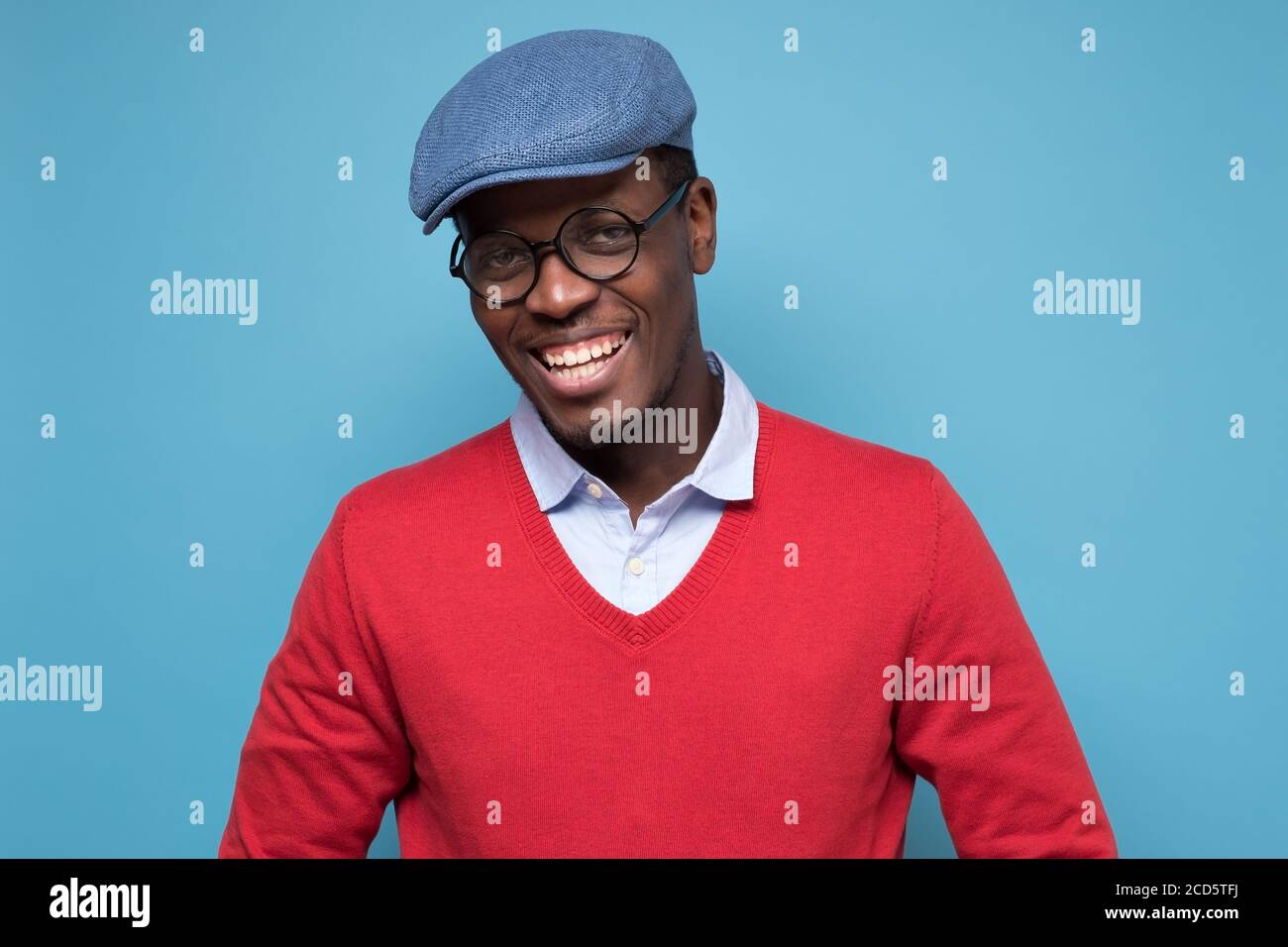 Smiling happy african man in glasses looking confident at camera Stock Photo