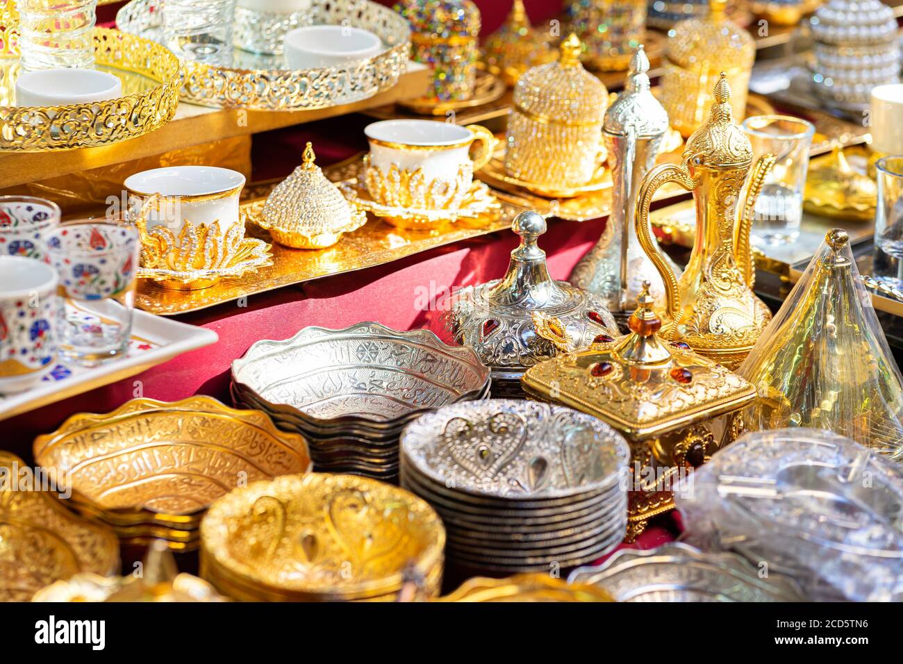 Metal bowls, dishes in market traditional Asian turkish bowls kitchenwear in silver and golden metal Stock Photo