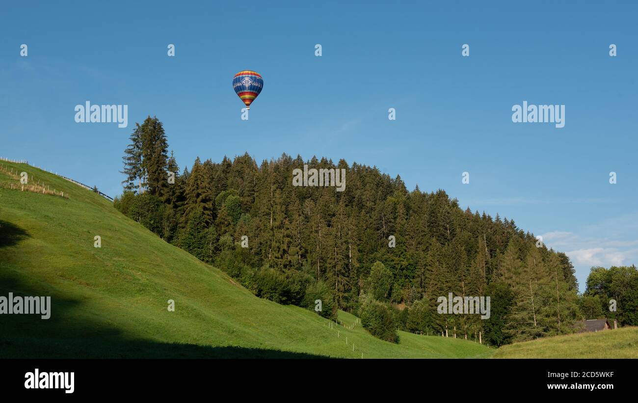 Balloon over Chateau d'Oex area, Switzerland Stock Photo