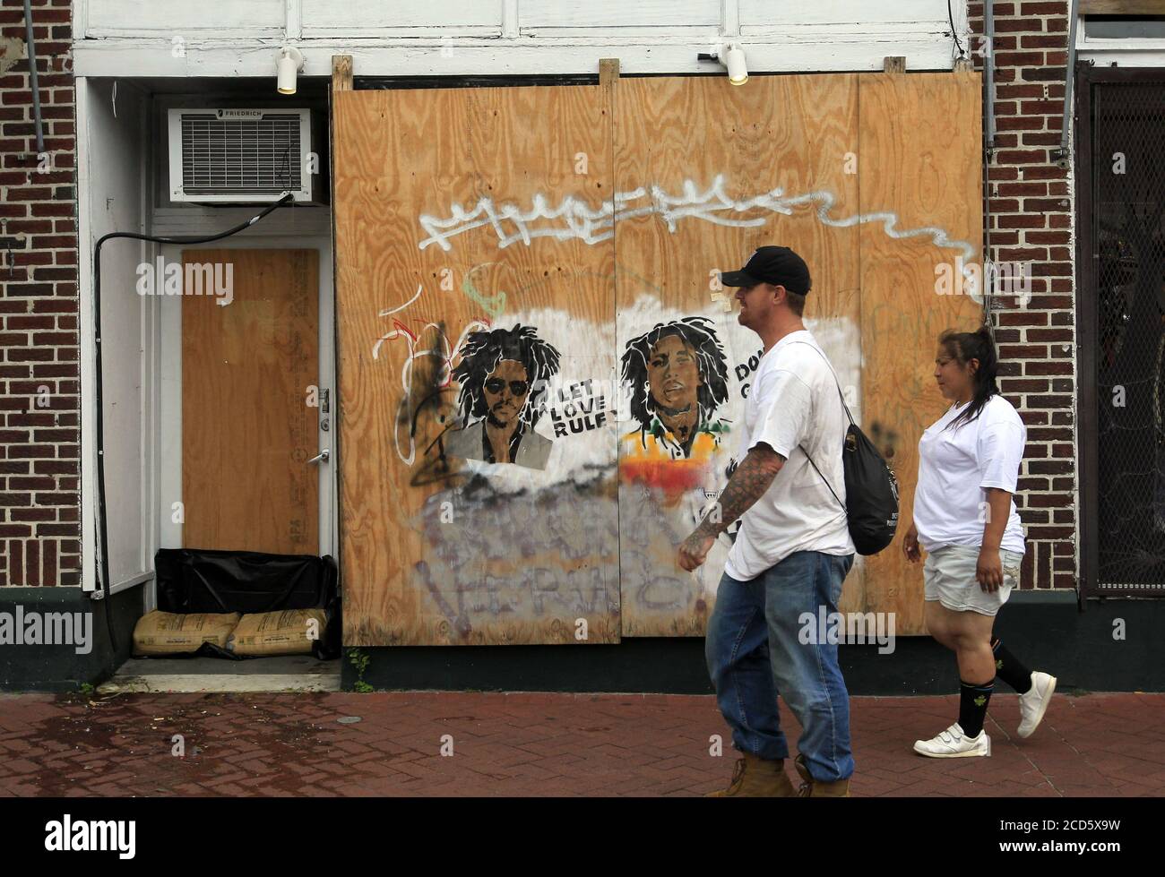 New Orleans, United States. 26th Aug, 2020. Storefronts are boarded up and doorways sandbagged in the New Orleans French Quarter as Hurricane Laura, a major Category 4 storm, skirts the coast of Louisiana Wednesday, August 26, 2020. Photo by AJ Sisco/UPI Credit: UPI/Alamy Live News Stock Photo