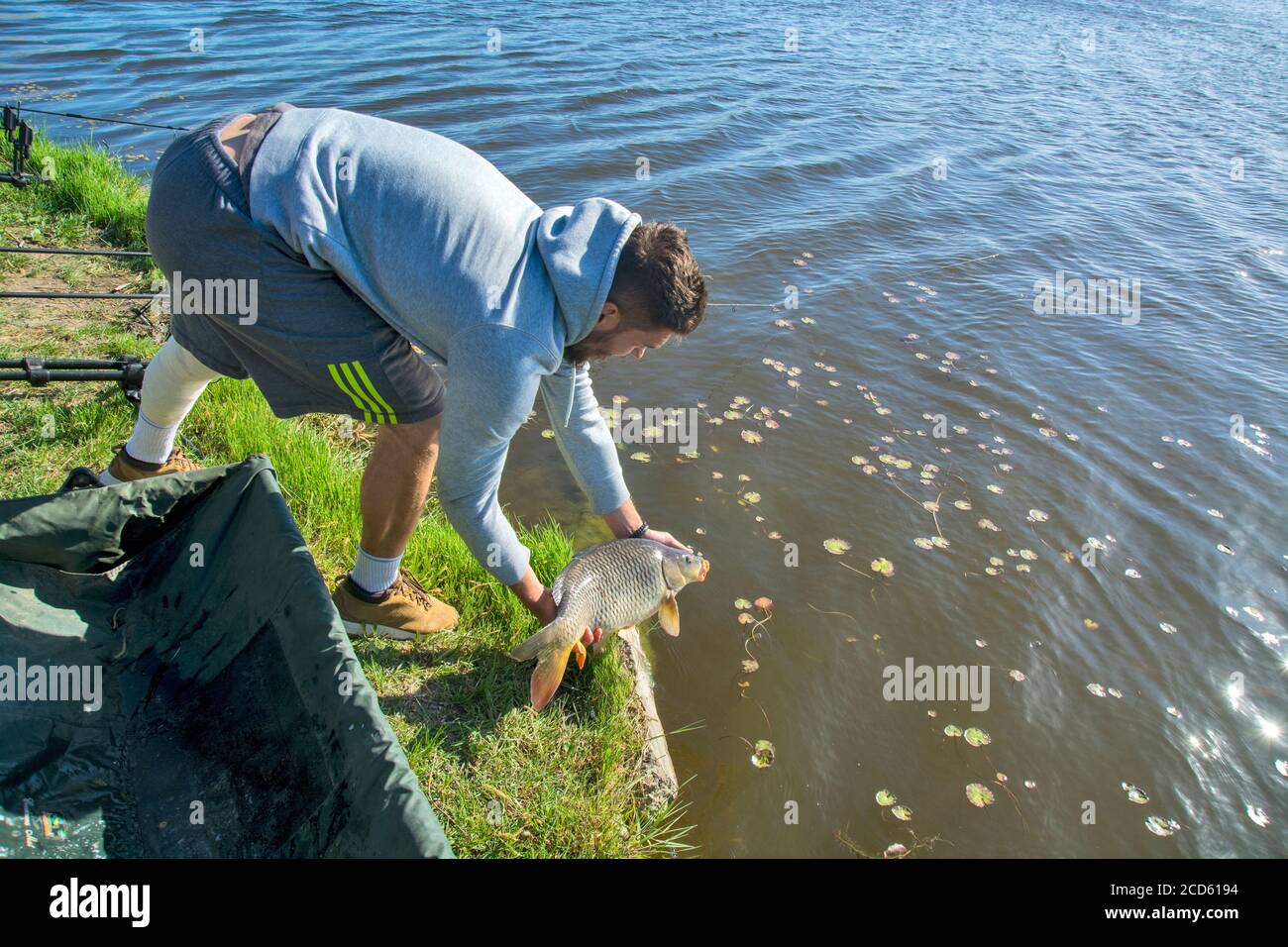 Fisherman fish carp big hi-res stock photography and images - Alamy