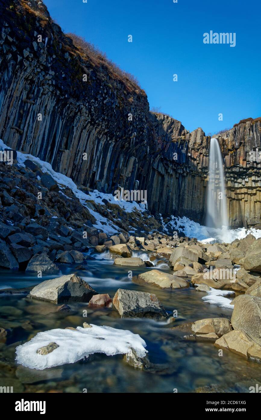 Svartifoss waterfall with basalt columns, Vatnajokull National Park, Skaftafell, Iceland Stock Photo