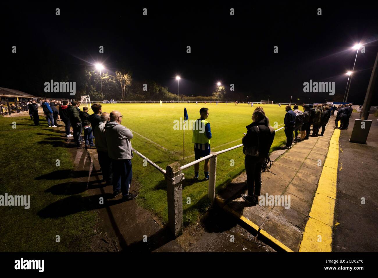 Bolton, UK. 26th August, 2020. Bury AFC supporters watch their teamÕs first competitive game in public, a Challenge match away to fellow North West Counties First Division North side Daisy Hill in the Westhoughton area of Bolton, UK. The Shakers phoenix club have played training games but it was announced on Monday that fans will be able to attend the game. Credit: Jon Super/Alamy Live News. Stock Photo