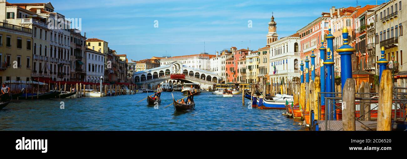 Rialto Bridge and gondolas in Grand Canal, Venice, Italy Stock Photo