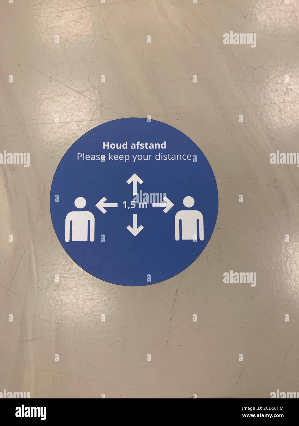1,5 meters social distancing sign (houd afstand)) at Eindhoven Airport. Eindhoven, North Brabant / Netherlands. Stock Photo