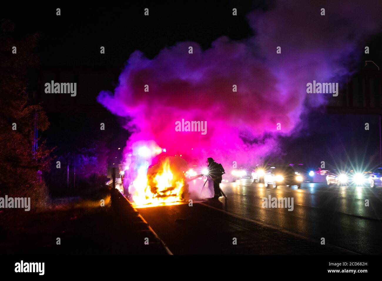 Car on fire night accident on the highway road with police Stock Photo ...