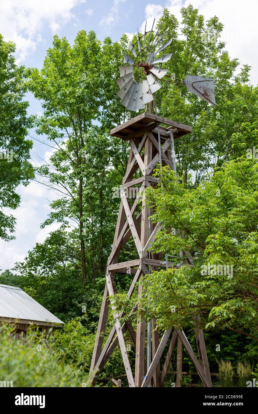 A windmill in the Indiana Family Farm Exhibit at the Fort Wayne Children's Zoo in Fort Wayne, Ind., USA. Stock Photo