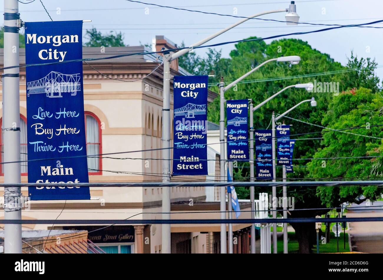 Banners hang on Main Street encouraging people to live, shop, and