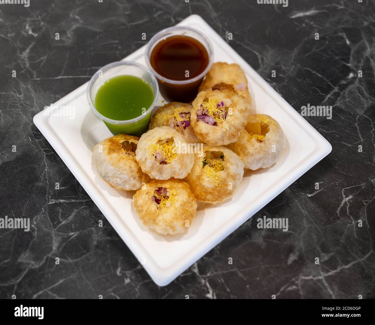 Delicious and Fresh Panipuri with dip sauce Stock Photo