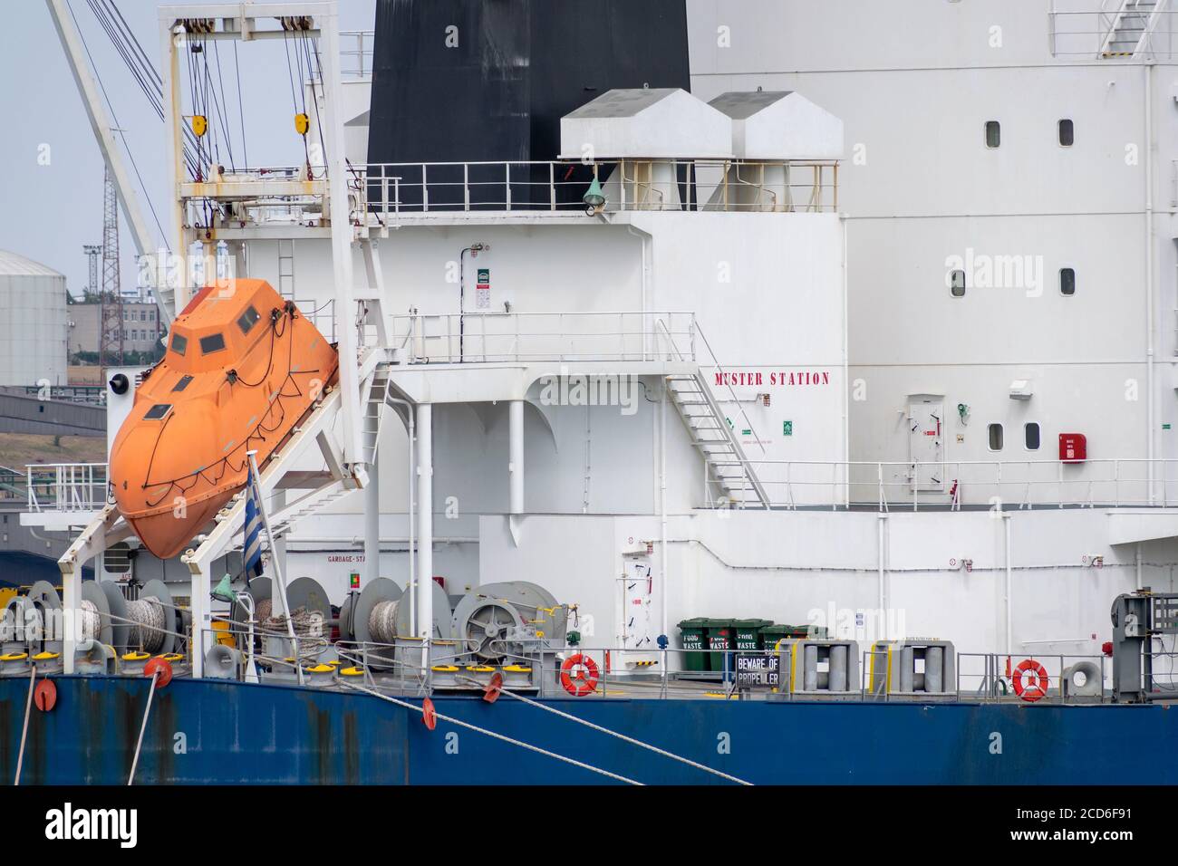 Lifeboat survival capsule on the cargo ship Stock Photo