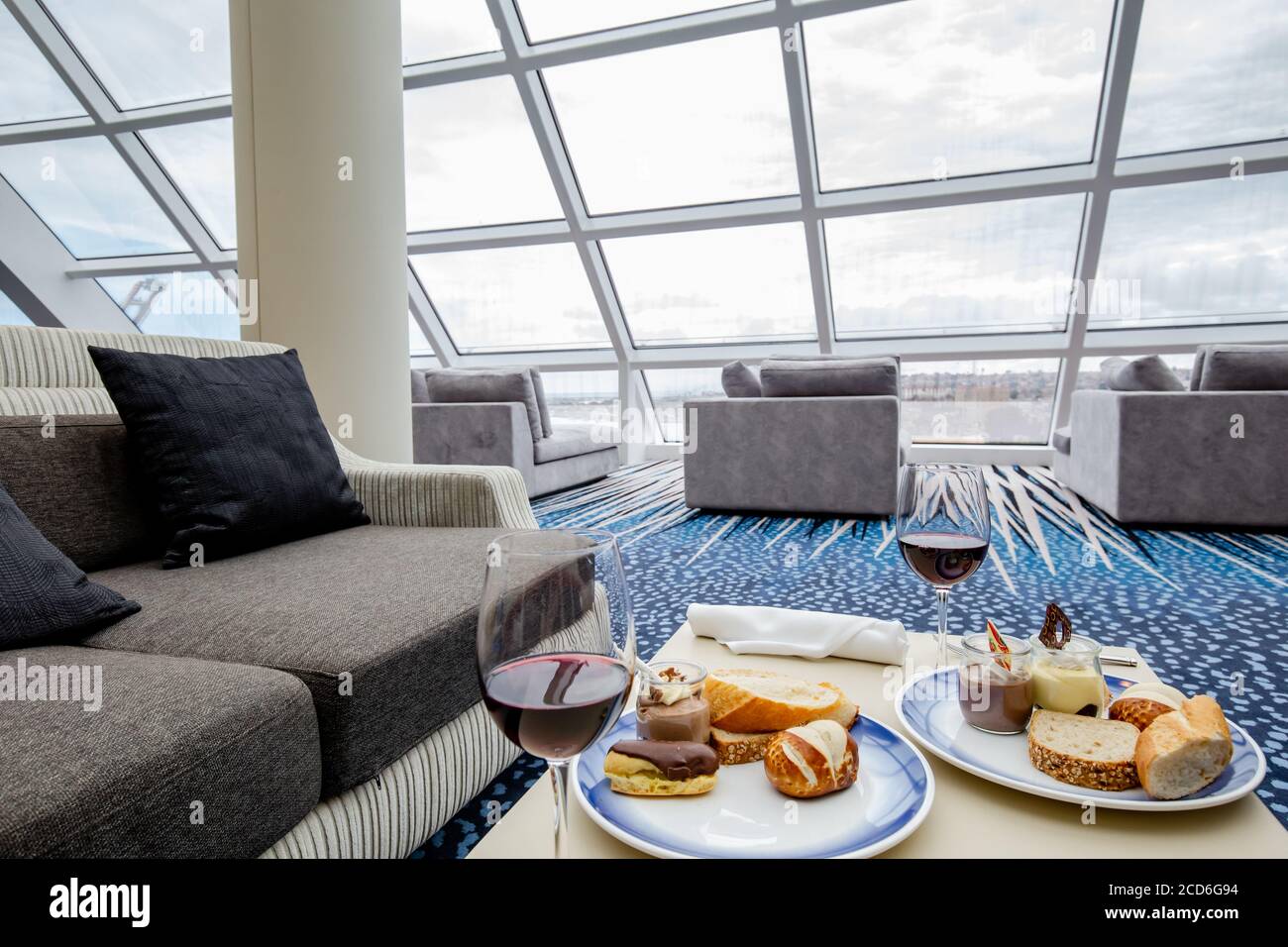 Red wine and pastries in the Horizon lounge, an exclusive Haven area on board Norwegian Joy NCL