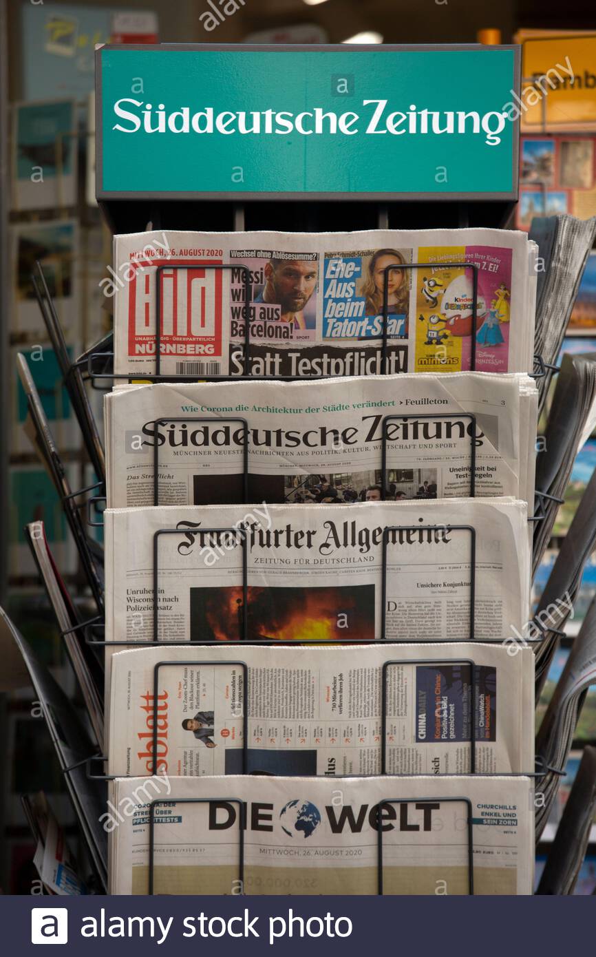 Stand of tabloid newspapers hires stock photography and images Alamy