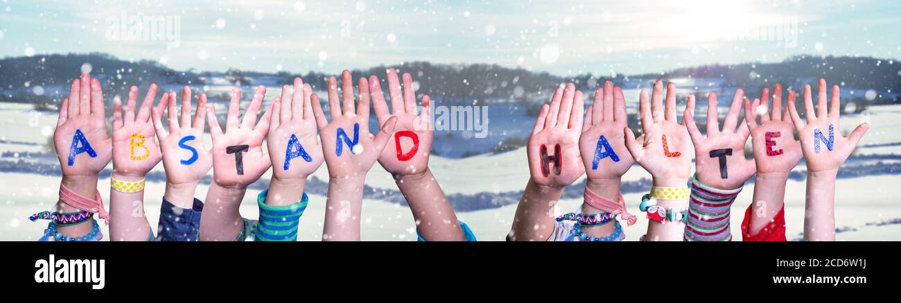 Children Hands Building Abstand Halten Means Keep Distance, Winter Background Stock Photo