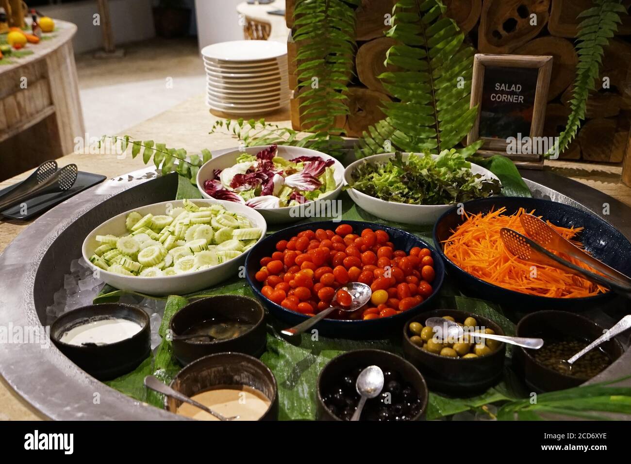 Bowls Of Mixed Fresh Organic Vegetables In Salad Bar Display