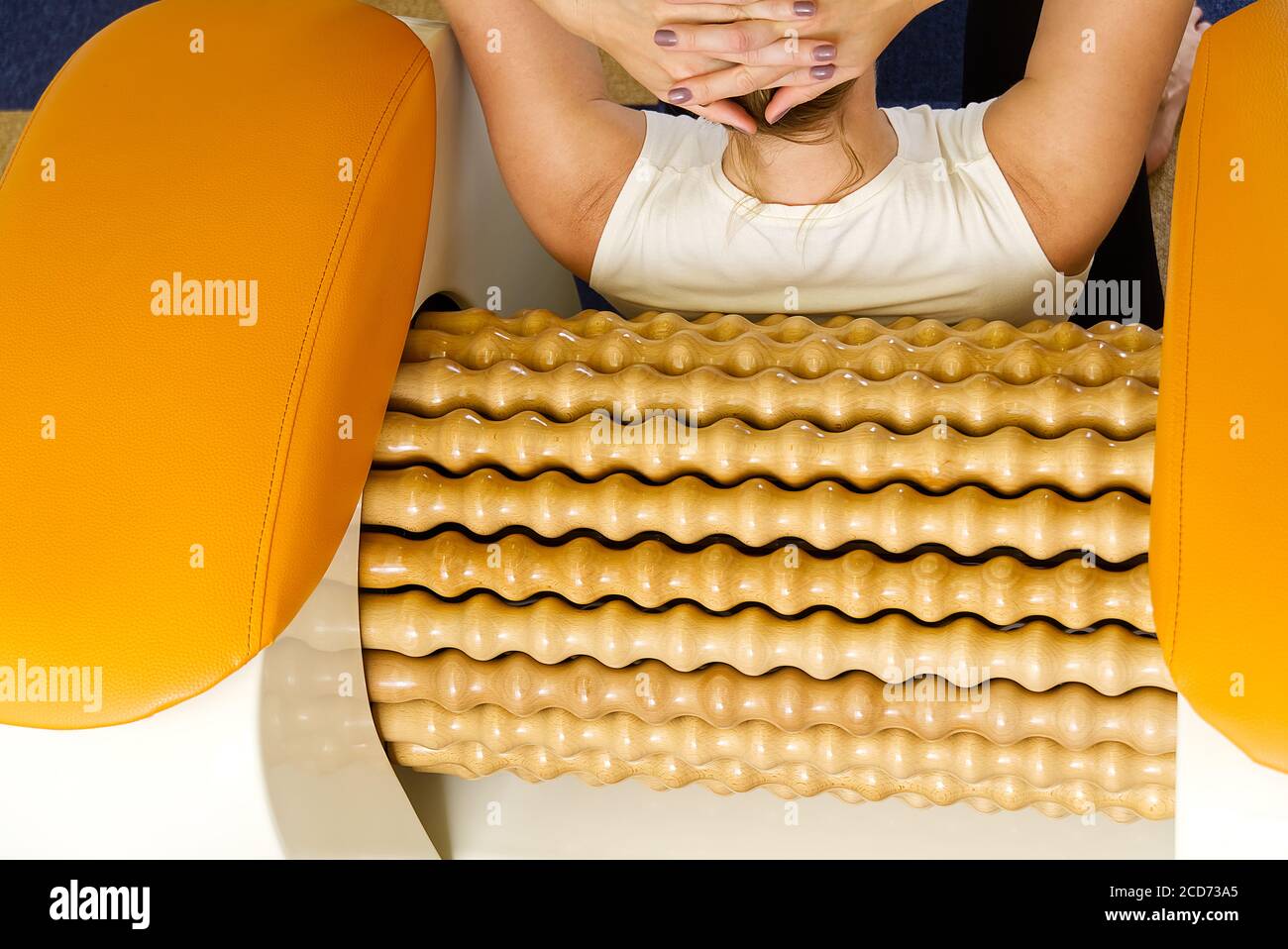 woman making massage for back. Roll Massage machine is a way to shape the figure. Skin Care body care concept modern relax massage equipment Stock Photo Alamy