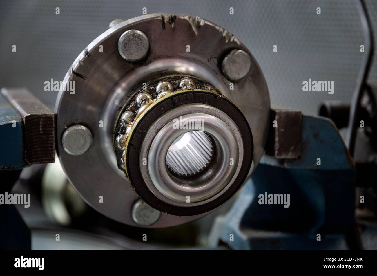 Broken hub, with visible bearings and grease Stock Photo Alamy