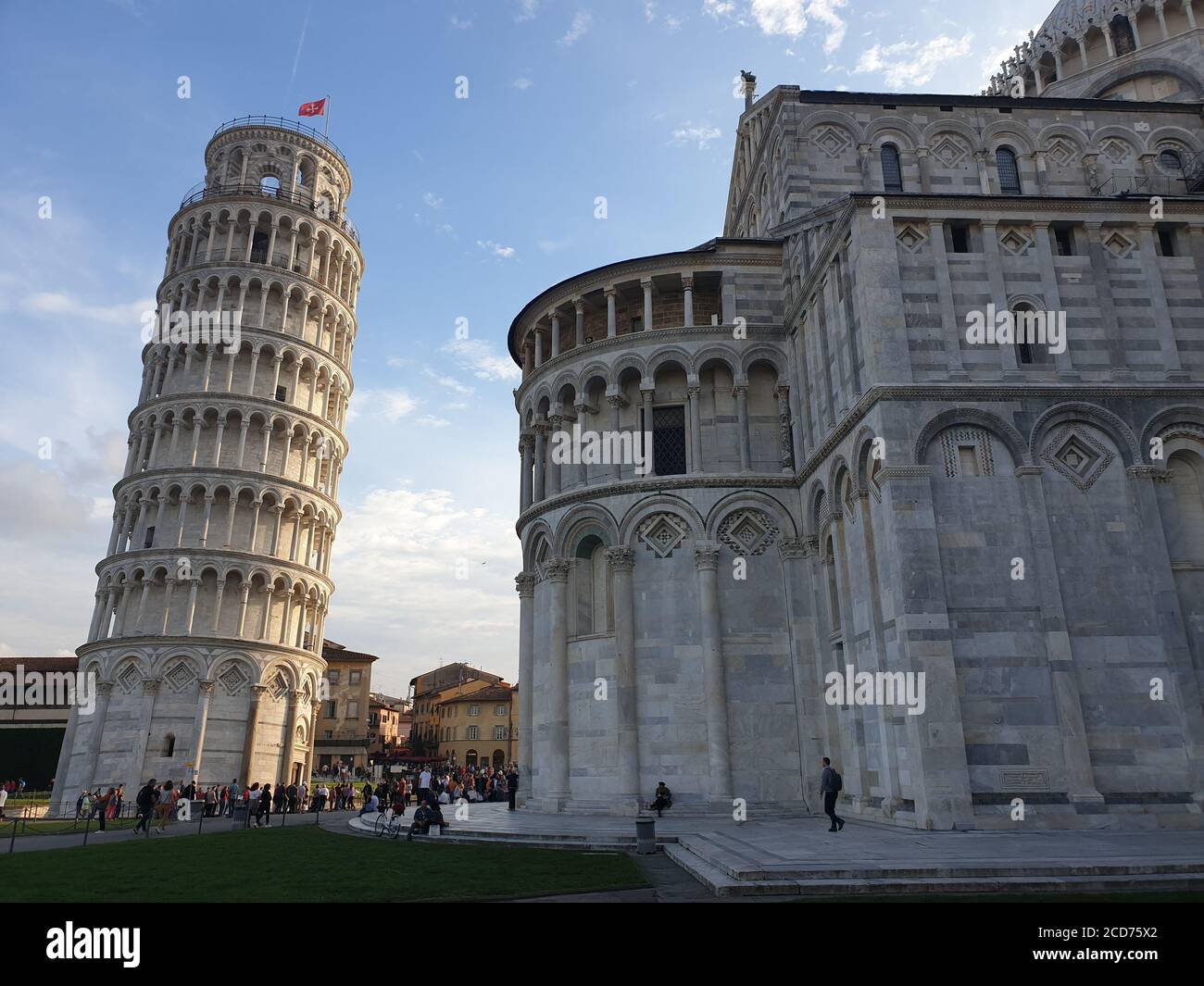 The leaning tower of Pisa and Piazza dei Miracoli in a sunny day - The Miracle Square, the Leaning Tower and the Cathedral is visited everyday by thou Stock Photo