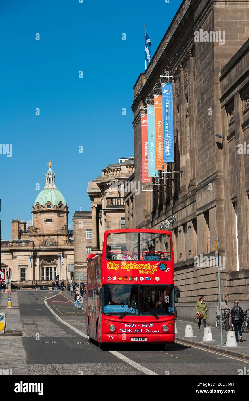 Open top tour bus in city of Edinburgh, Scotland. Stock Photo